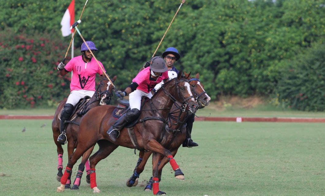 Naveen Singh and Lt. Col. Vishal Chauhan defending another goal for V Polo/ ACC&S