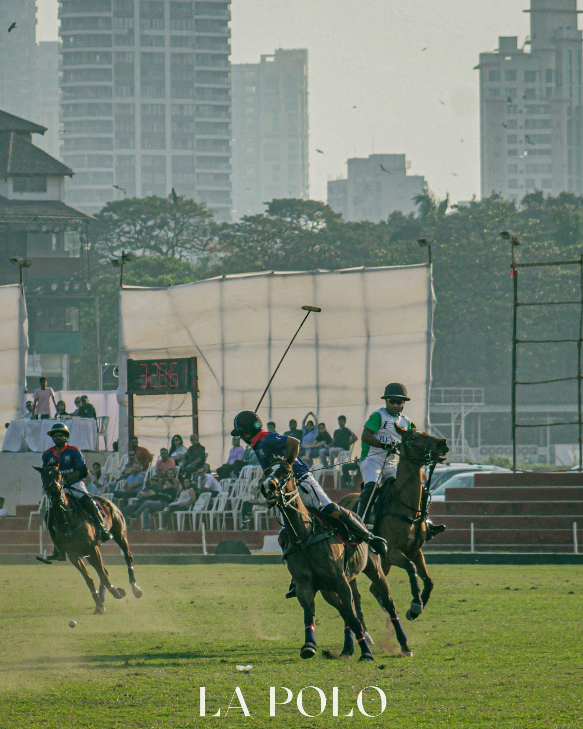 The determination of the polo players is evident in their every move.